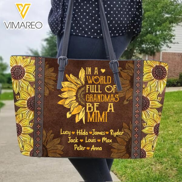 PERSONALIZED IN A WORLD FULL OF GRANDMAS BE A TITLE SUNFLOWER LEATHER BAG TNMA0212
