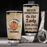 Personalized Never Understimate An Old Lady Reading Books Tumbler Printed NQHC0407