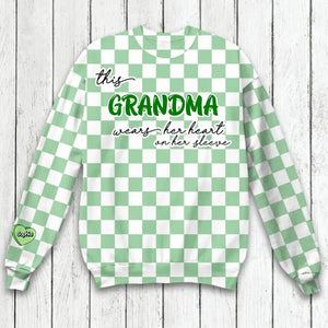 Personalized This Grandma Wears Her Heart On Her Sleeve Patrick Day Printed Sweatshirt QTHQ1002