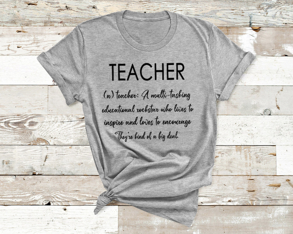 TEACHER (n) teacher: A multitasking