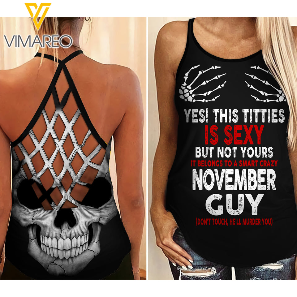 THIS TITTIES BELONGS TO A SMART NOVEMBER GUY CRISS-CROSS TANK TOP